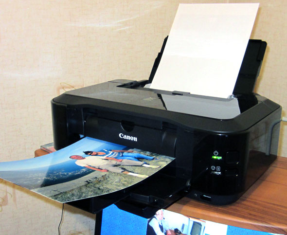 Принтер печатает темные фотографии